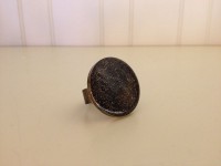 bronskleurige ring met gouden sterrenhemel